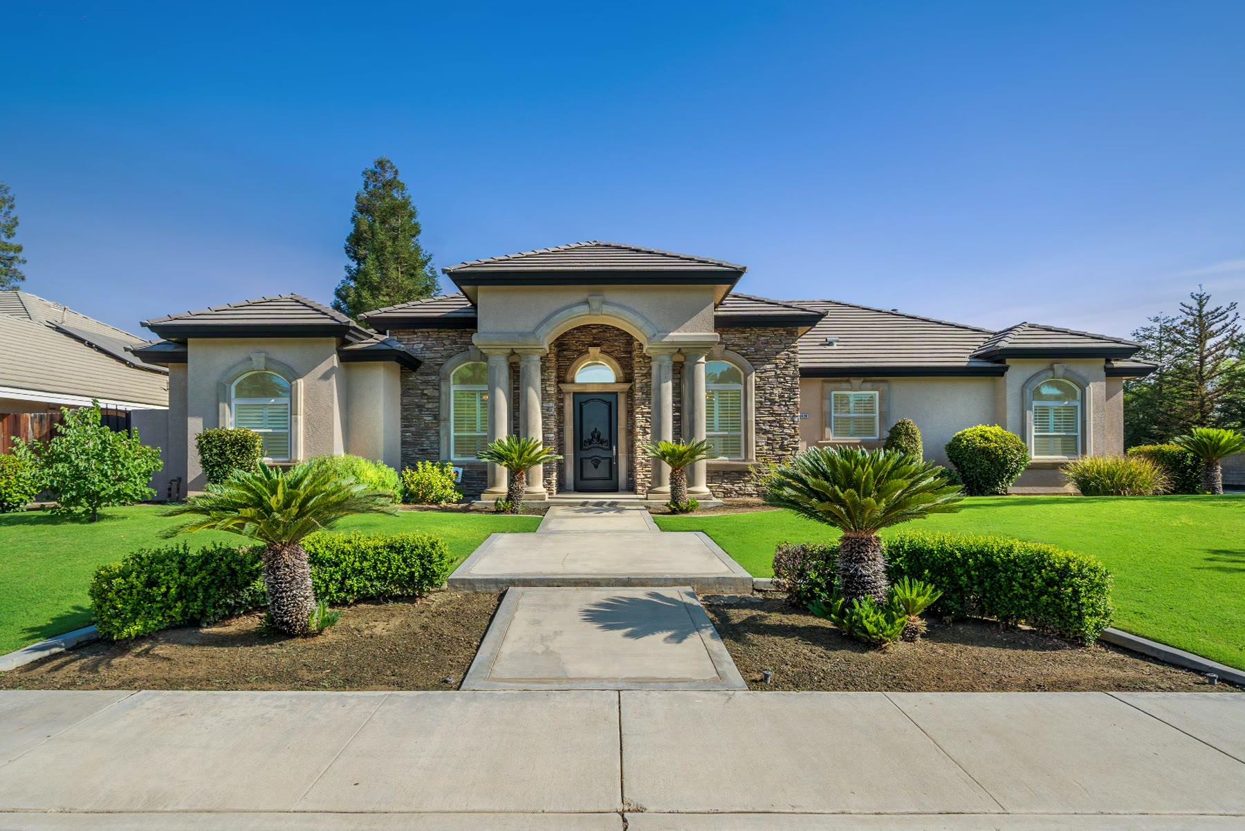 Bakersfield home exterior from day to dusk